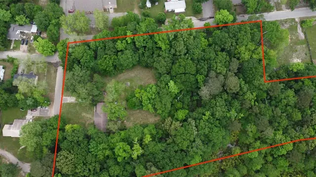 a view of a garden from a balcony