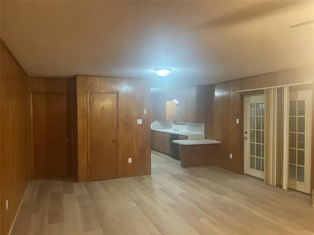 a bathroom with a shower and a mirror