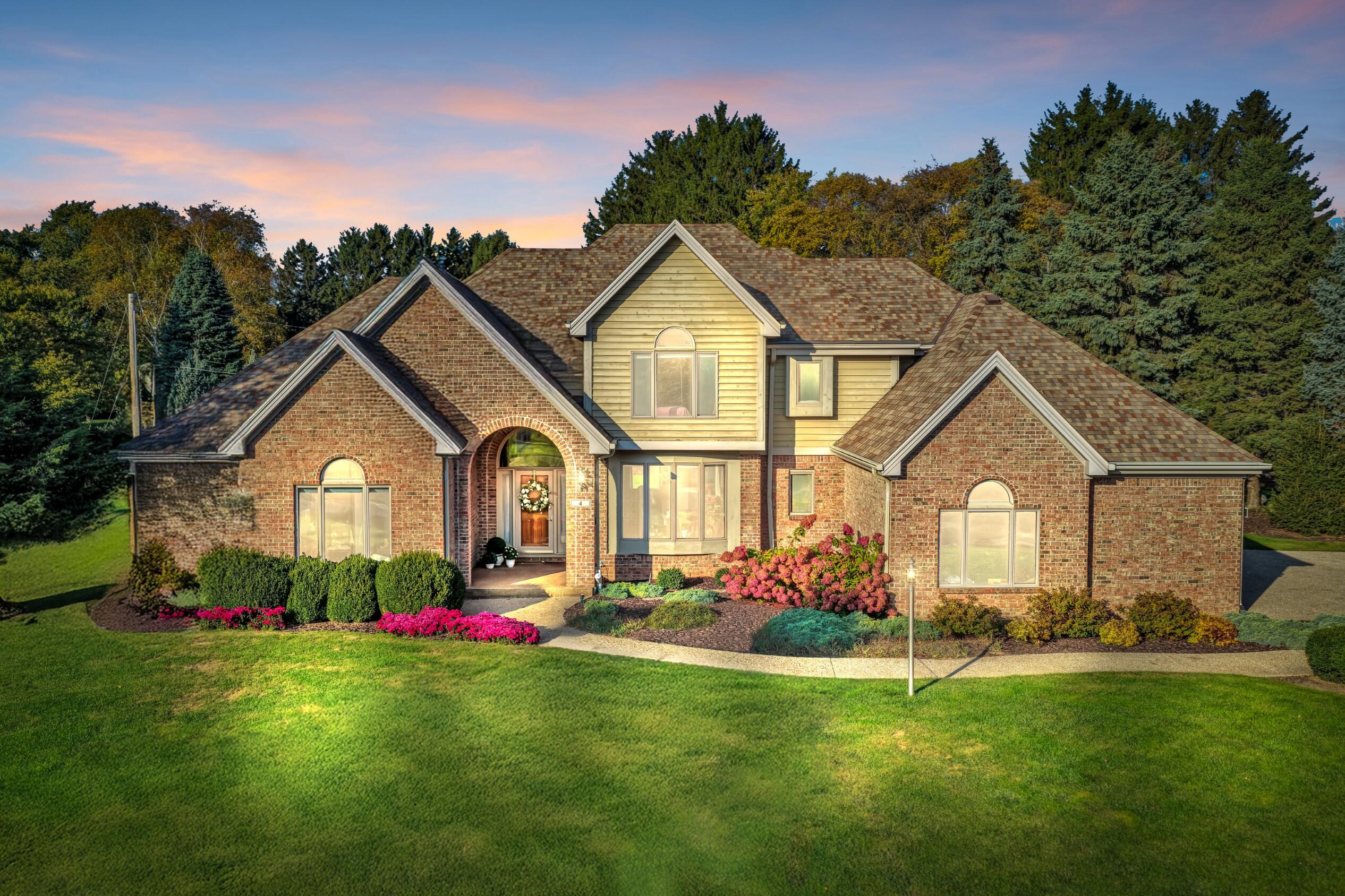 4 Lake Pointe Circle Wind Point, WI 53402 - Photo 1 of 60 Twilight on Lake Pointe Circle