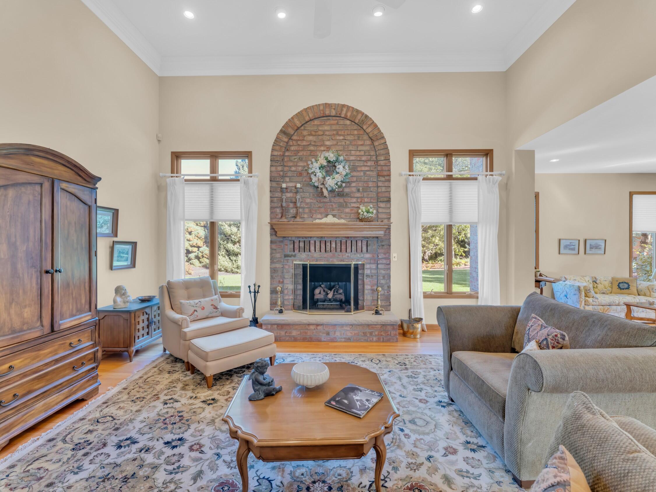 4 Lake Pointe Circle Wind Point, WI 53402 - Photo 15 of 60 Gas FP Flanked by elongated windows