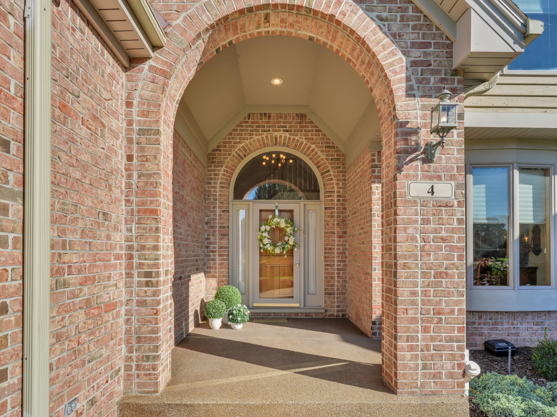 4 Lake Pointe Circle Wind Point, WI 53402 - Photo 7 of 60 Covered Entrance Welcomes You Home!
