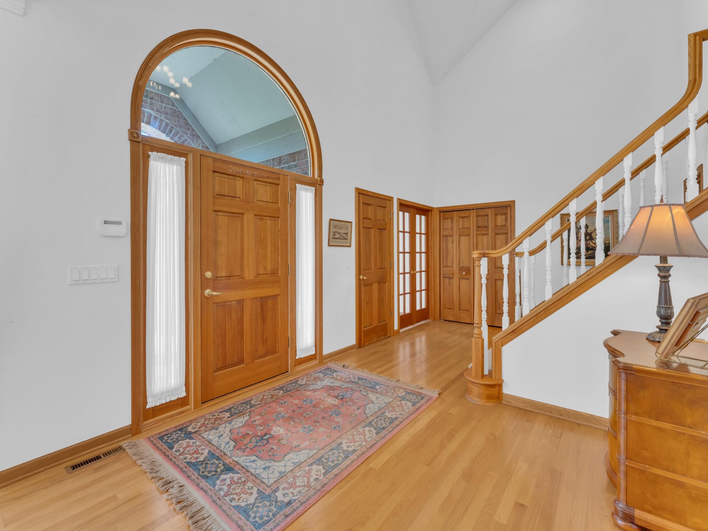 4 Lake Pointe Circle Wind Point, WI 53402 - Photo 8 of 60 Grand Foyer with 18’ Volume Ceilings