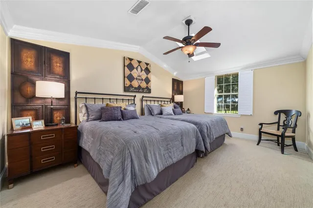 a bed room with a bed and a flat screen tv