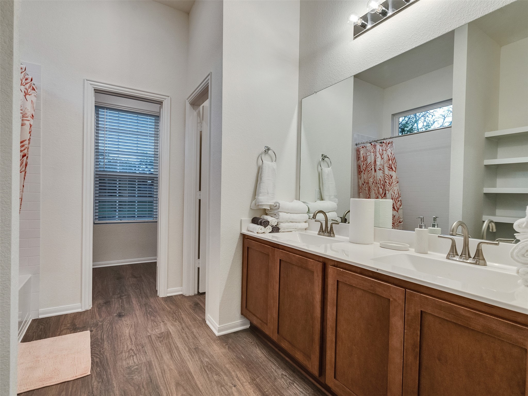 403 Magnolia Lane Richwood, TX 77531 - Photo 11 of 21 a bathroom with a double vanity sink and mirror