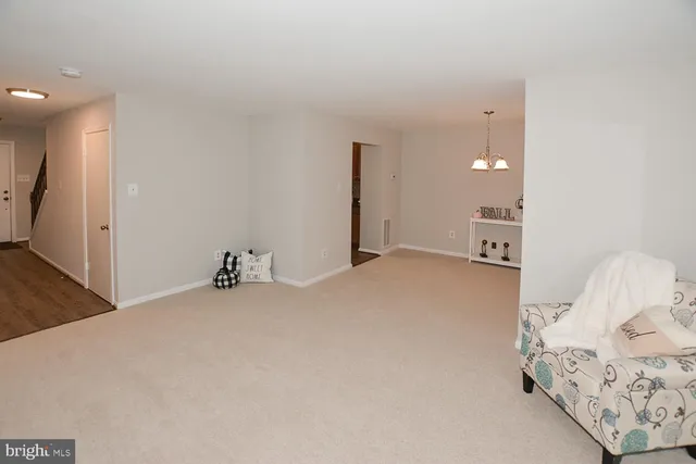 a view of a livingroom with a bed