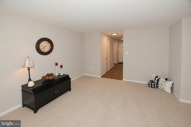 a bed room with a bed and a table