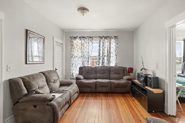 a living room with furniture and a couch
