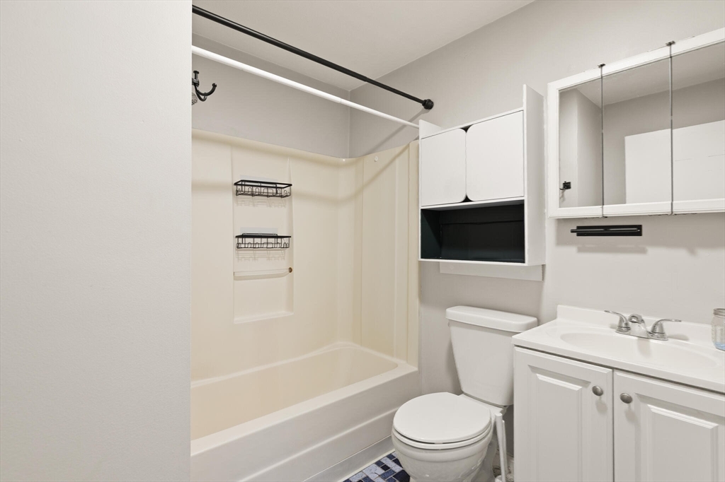 136 Franklin Street Lynn, MA 01902 - Photo 25 of 33 a bathroom with a sink a toilet and shower