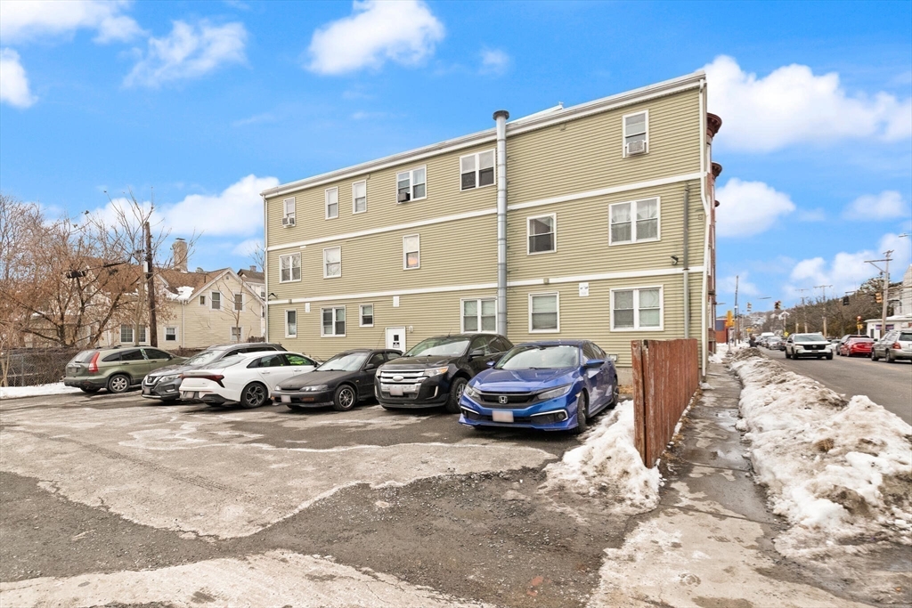 136 Franklin Street Lynn, MA 01902 - Photo 4 of 33 a view of a car park in front of a building