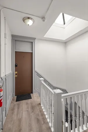 a view of hallway with stairs