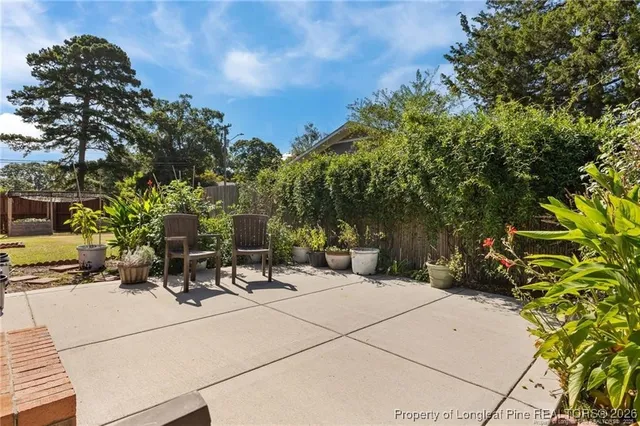 a view of a house with a yard and garage