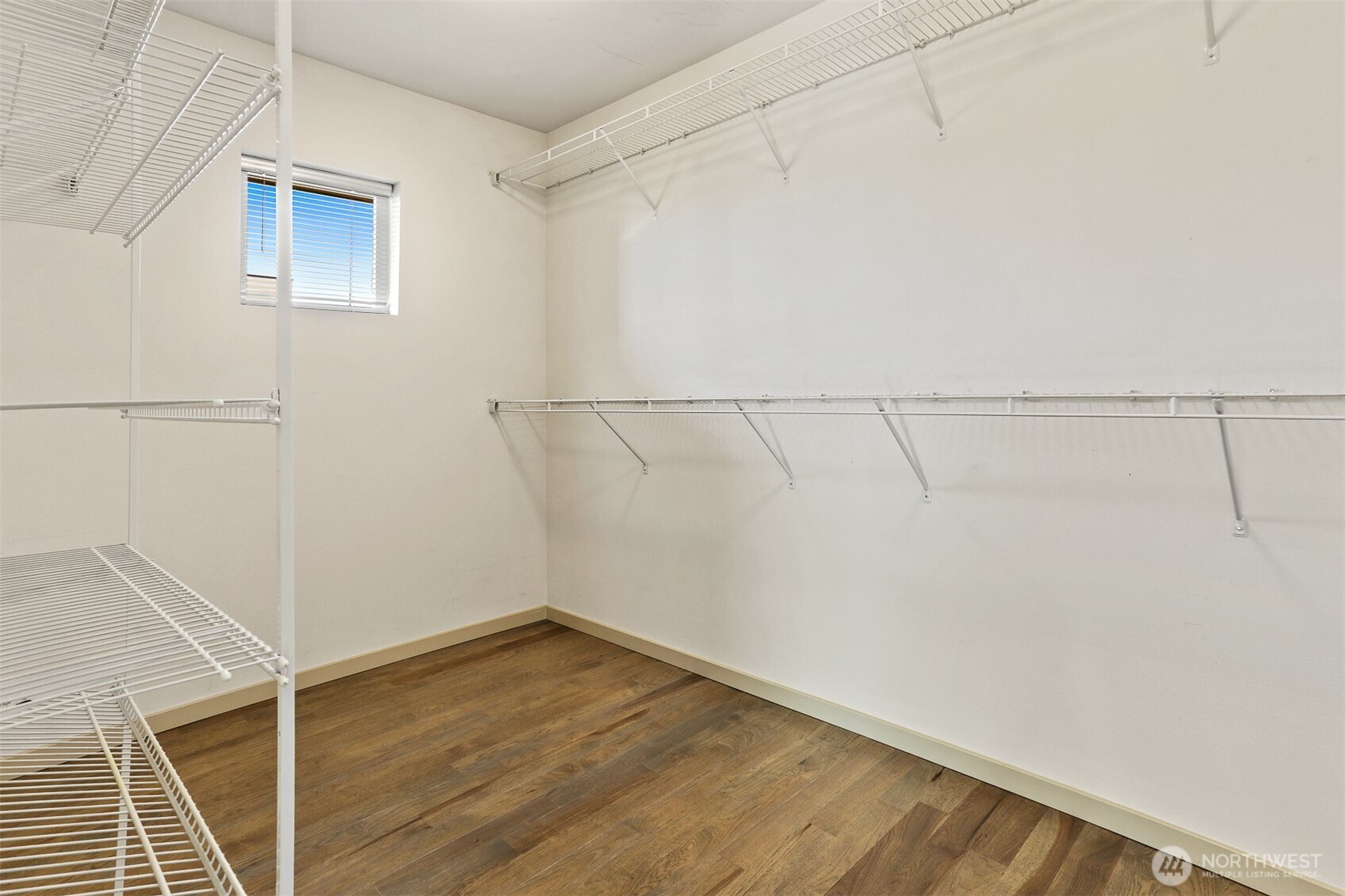 2426B Northwest 64th Street Seattle, WA 98107 - Photo 23 of 38 a view of a room with empty racks