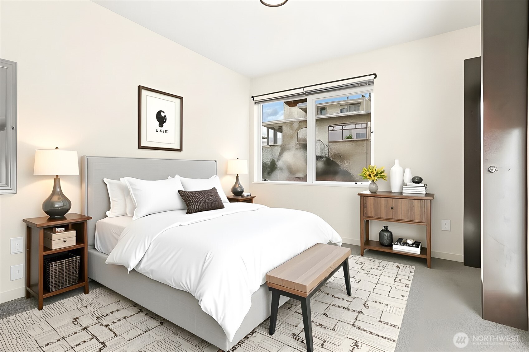 2426B Northwest 64th Street Seattle, WA 98107 - Photo 25 of 38 a bedroom with a bed and wooden floor