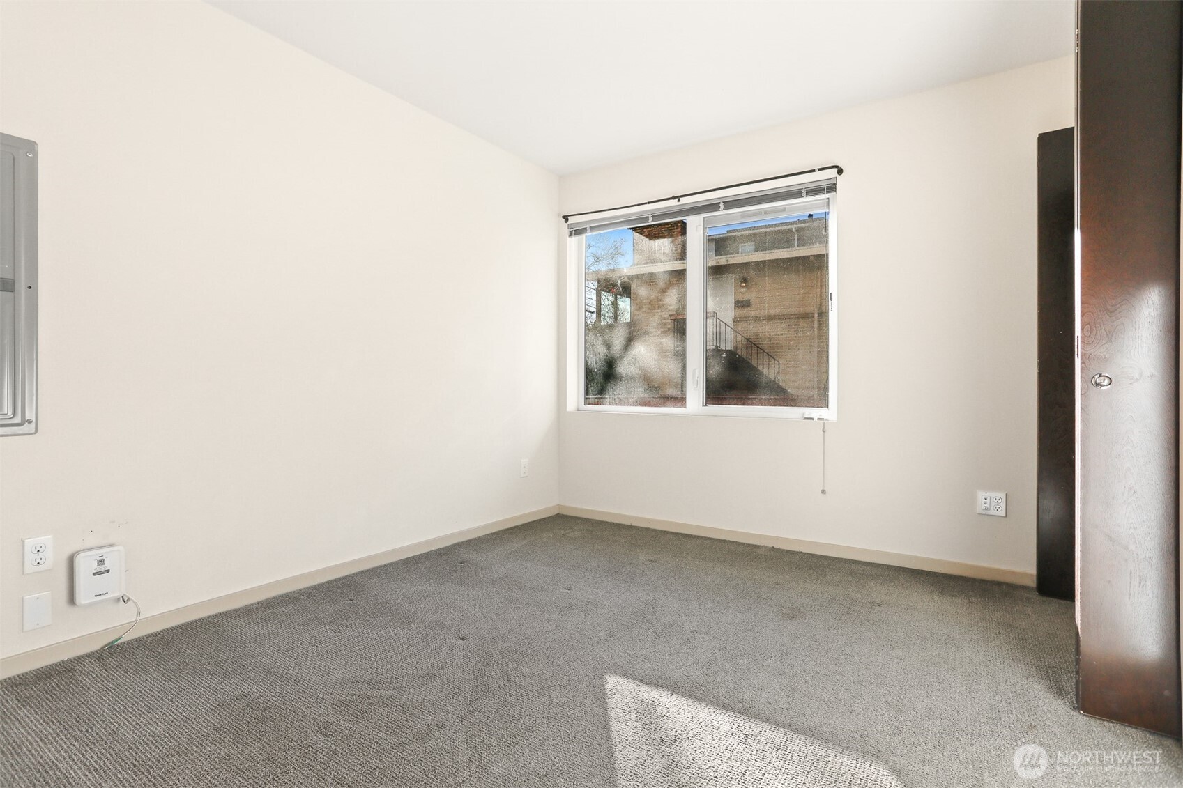 2426B Northwest 64th Street Seattle, WA 98107 - Photo 29 of 38 an empty room with a window