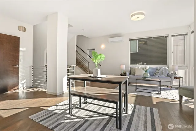 a living room with furniture and a table