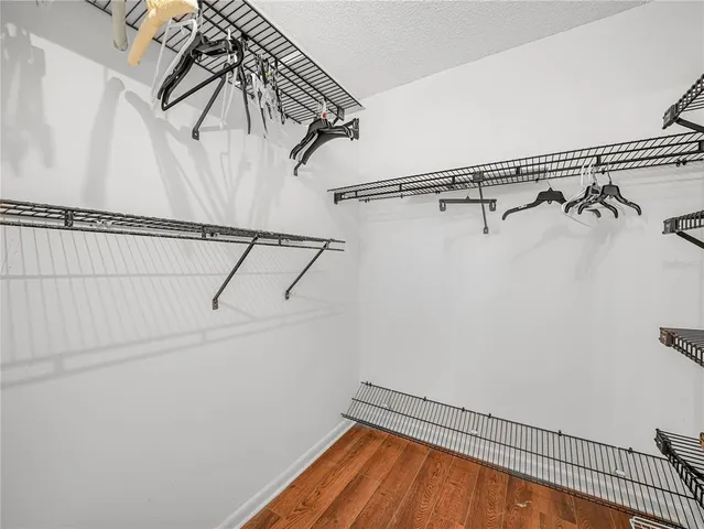 a view of a room with racks on the wall