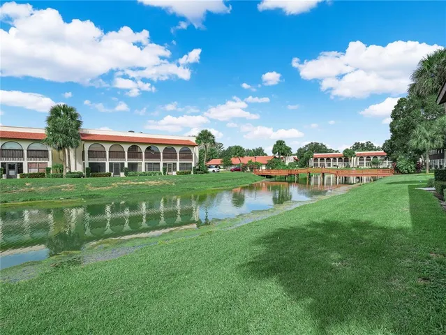 a view of a house with a big yard