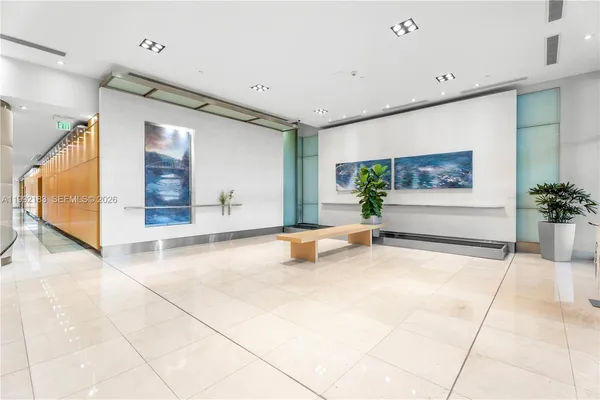 a view of an entryway with a livingroom