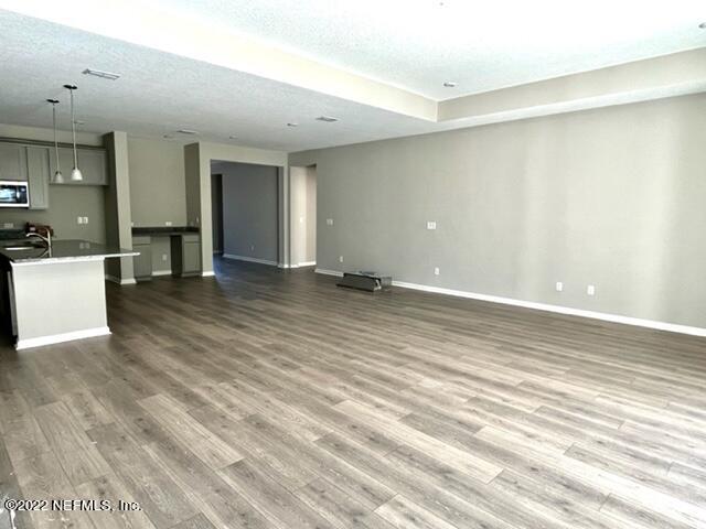 3865 Eagle Rock Road Middleburg, FL 32068 - Photo 5 of 7 a view of a livingroom with wooden floor