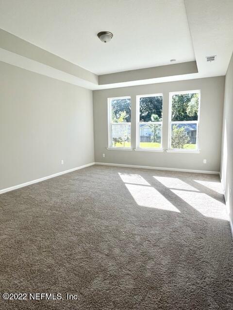 3865 Eagle Rock Road Middleburg, FL 32068 - Photo 7 of 7 an empty room with windows