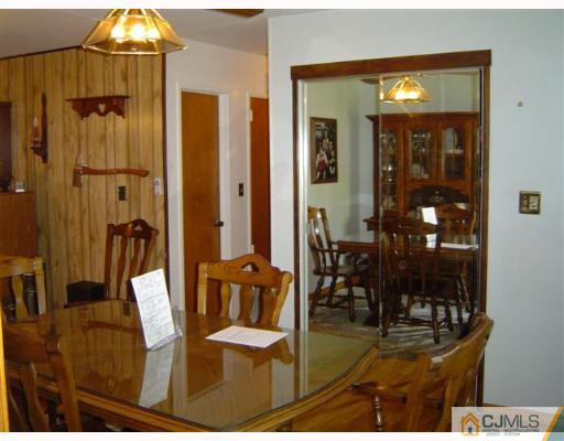 19 Georgetown Road Old Bridge, NJ 08859 - Photo 3 of 8 a view of a dining room with furniture