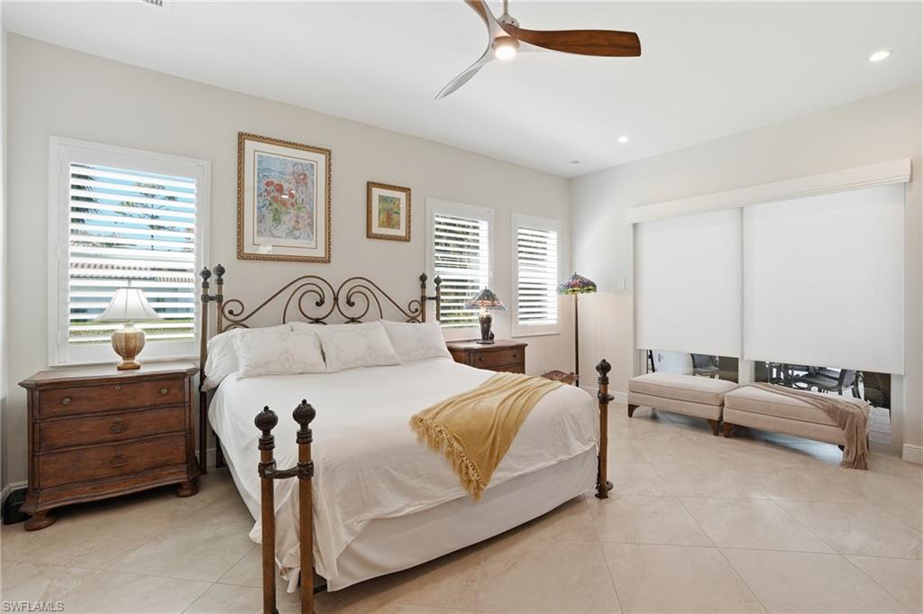3707 5th Avenue Southwest Naples, FL 34117 - Photo 15 of 48 Bedroom with a ceiling fan, light tile patterned flooring, and recessed lighting