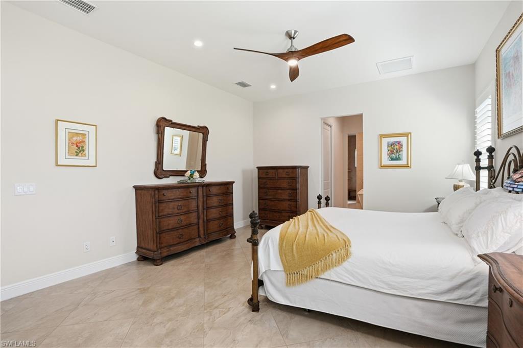 3707 5th Avenue Southwest Naples, FL 34117 - Photo 16 of 48 Bedroom featuring a ceiling fan and recessed lighting