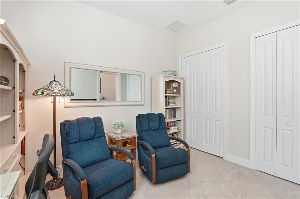 3707 5th Avenue Southwest Naples, FL 34117 - Photo 33 of 48 Large den with French pocket doors and double closets. Lot's of storage!!!