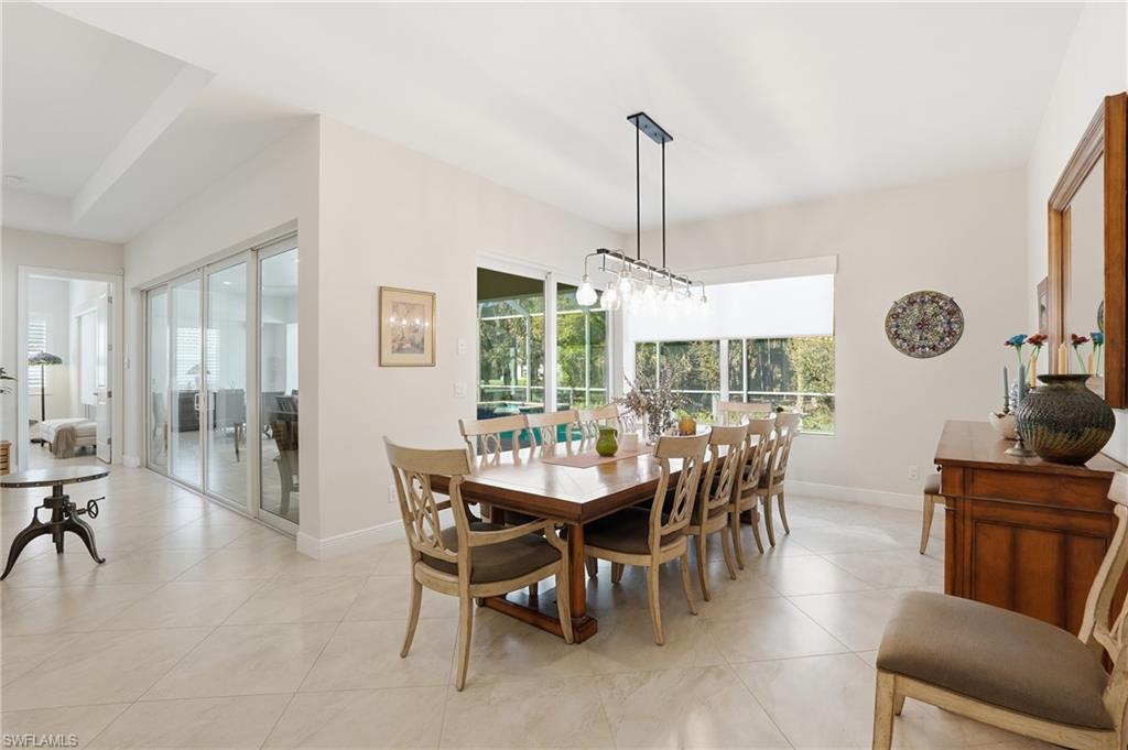 3707 5th Avenue Southwest Naples, FL 34117 - Photo 6 of 48 Seat the entire family and guest in this expansive dining room