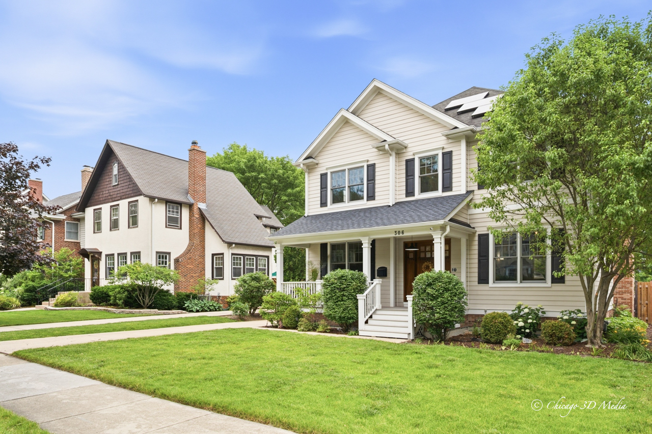306 17th Street Wilmette, IL 60091 - Photo 42 of 48 a front view of a house with a yard