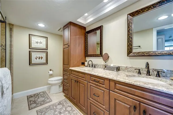 a bathroom with a shower and a toilet