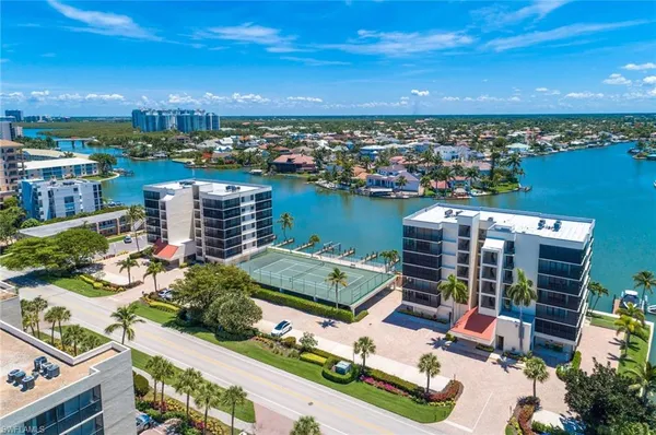 a view of a city with an ocean view