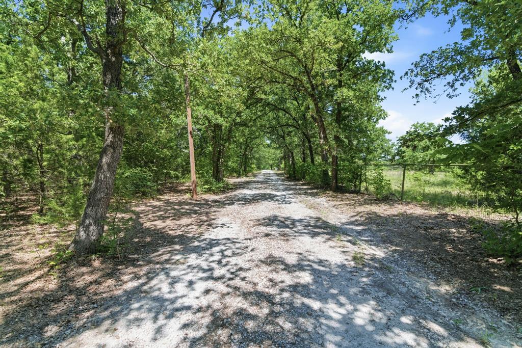 321 Cr 211 Road Gainesville, TX 76240 - Photo 23 of 40 Driving to the barn.