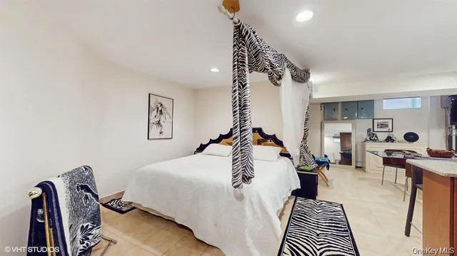 a bed room with a bed and a rug