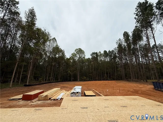 a view of swimming pool with a yard