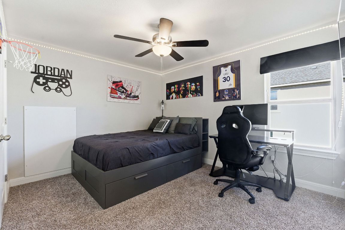 15604 Cabrillo Way Austin, TX 78738 - Photo 16 of 33 a living room with furniture and a window