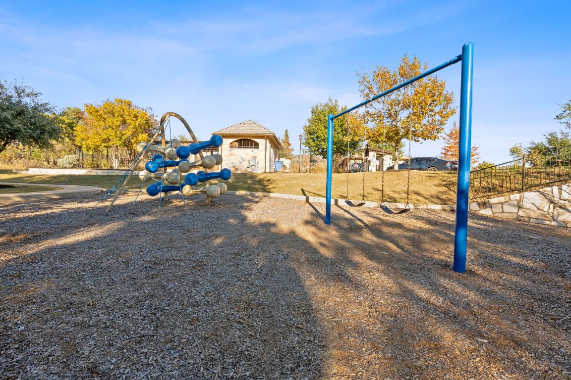 15604 Cabrillo Way Austin, TX 78738 - Photo 25 of 33 a view of car parked on the road