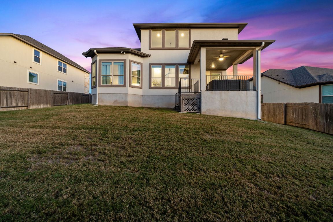 15604 Cabrillo Way Austin, TX 78738 - Photo 30 of 33 a view of a house with a yard