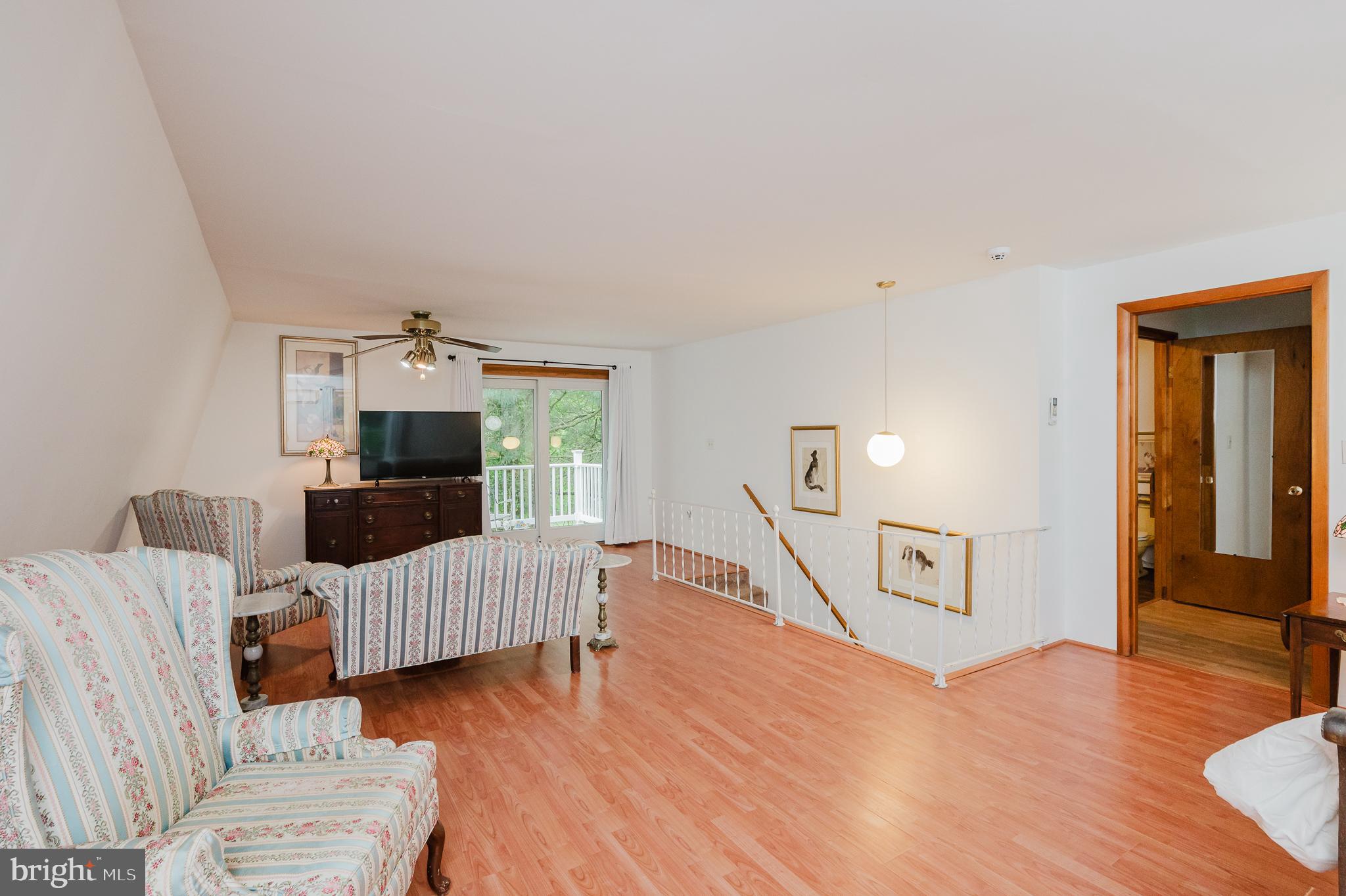 710 Magnolia Road Joppa, MD 21085 - Photo 24 of 58 a living room with furniture and a flat screen tv