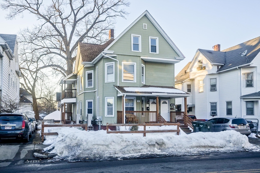 202 Oakland Street Springfield, MA 01108 - Photo 1 of 39 a front view of a building with sitting area