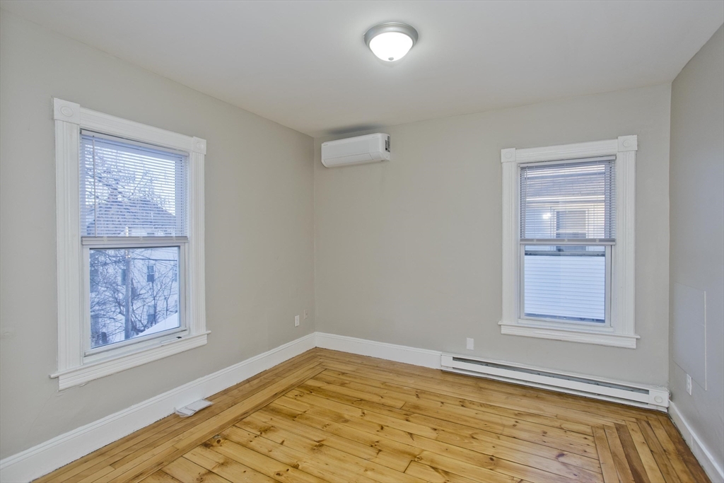 202 Oakland Street Springfield, MA 01108 - Photo 11 of 39 a view of empty room with window