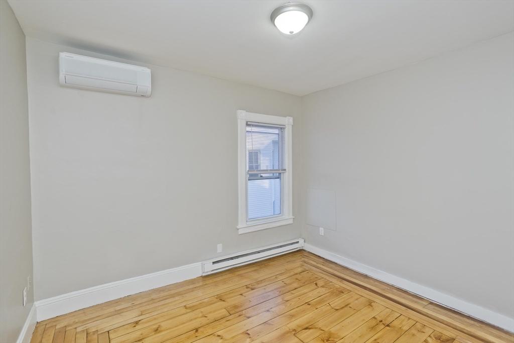202 Oakland Street Springfield, MA 01108 - Photo 12 of 39 a view of empty room with window