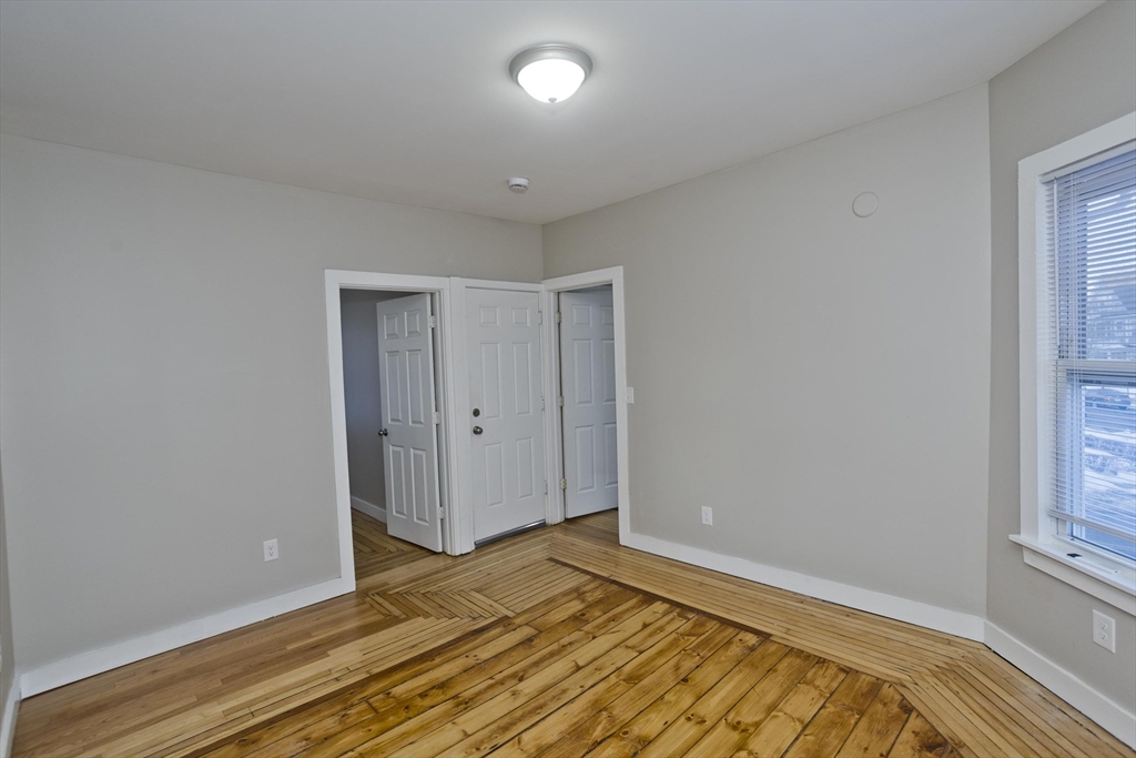 202 Oakland Street Springfield, MA 01108 - Photo 16 of 39 a view of an empty room and window