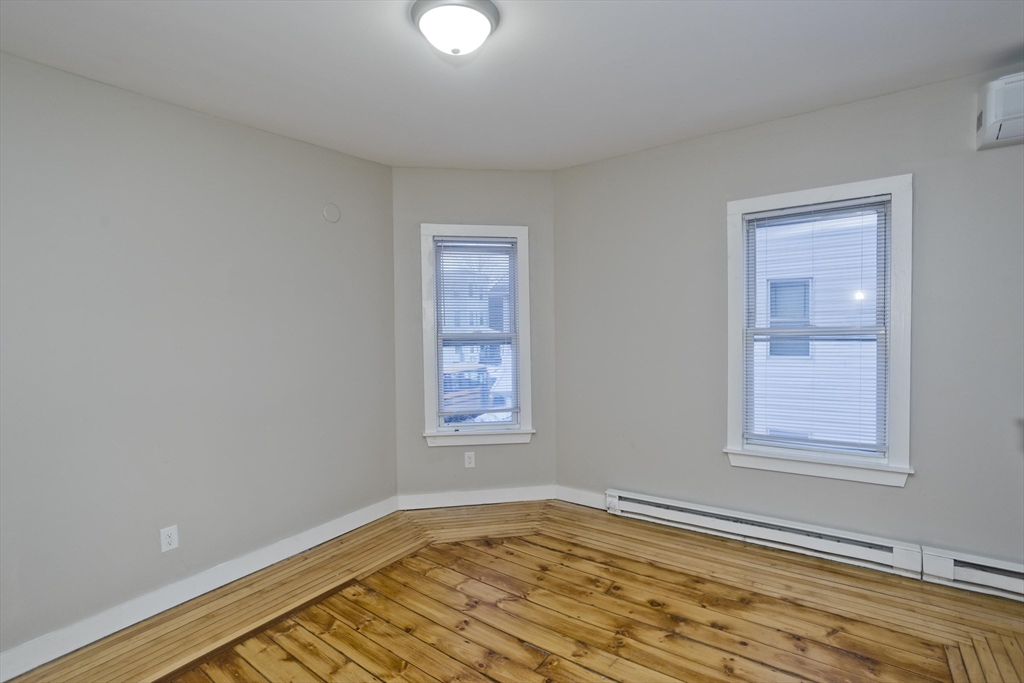 202 Oakland Street Springfield, MA 01108 - Photo 17 of 39 a view of an empty room and window