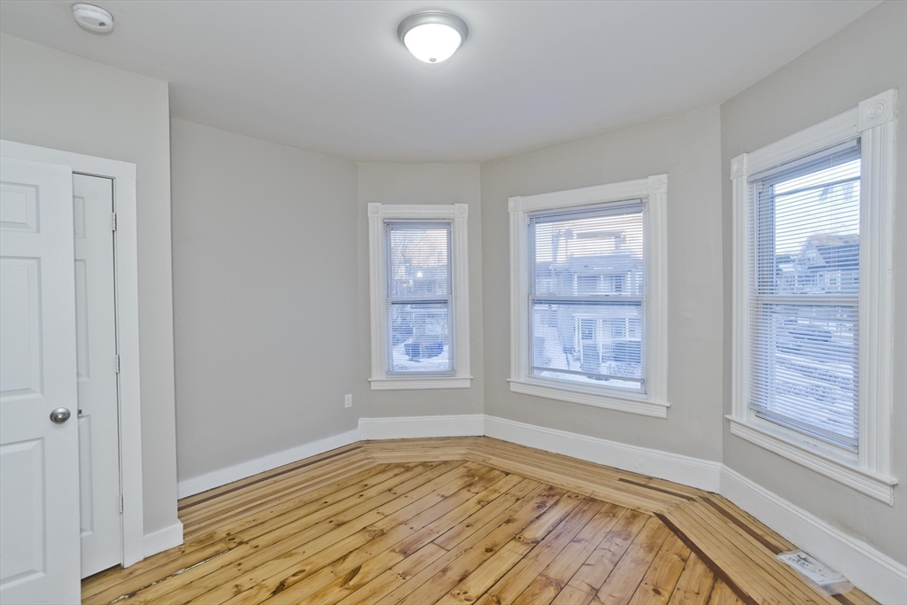202 Oakland Street Springfield, MA 01108 - Photo 19 of 39 a view of an empty room and window