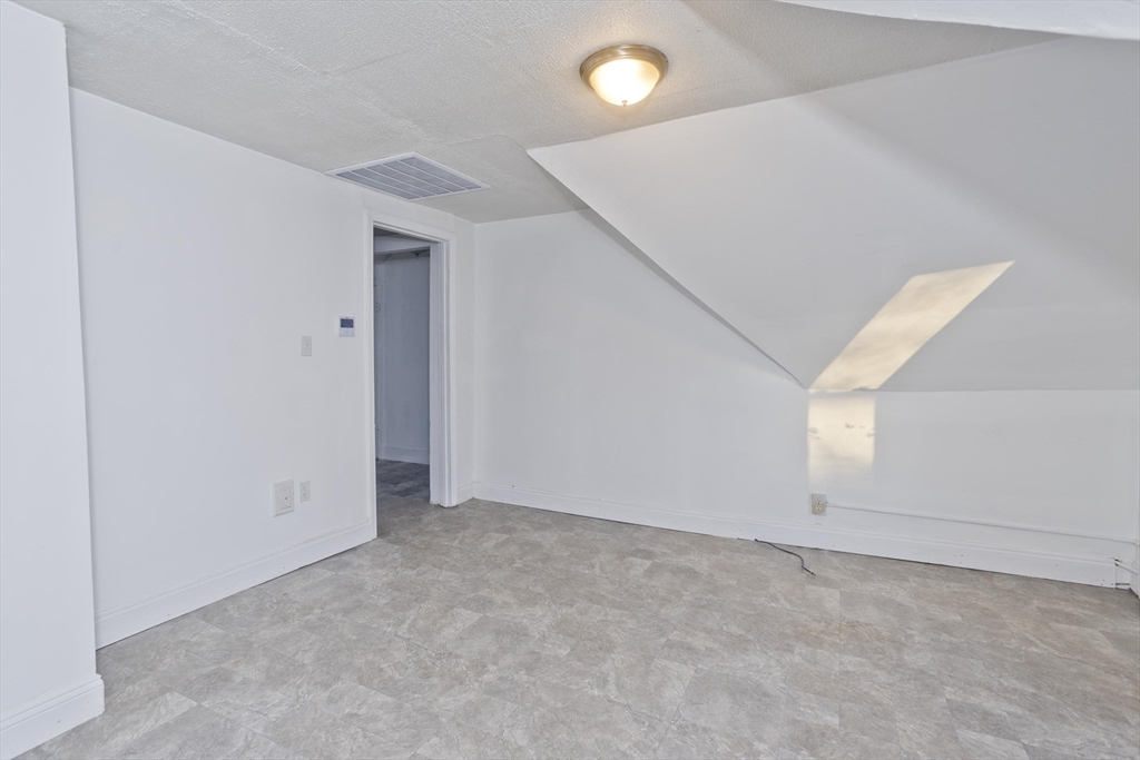 202 Oakland Street Springfield, MA 01108 - Photo 28 of 39 an empty room with windows