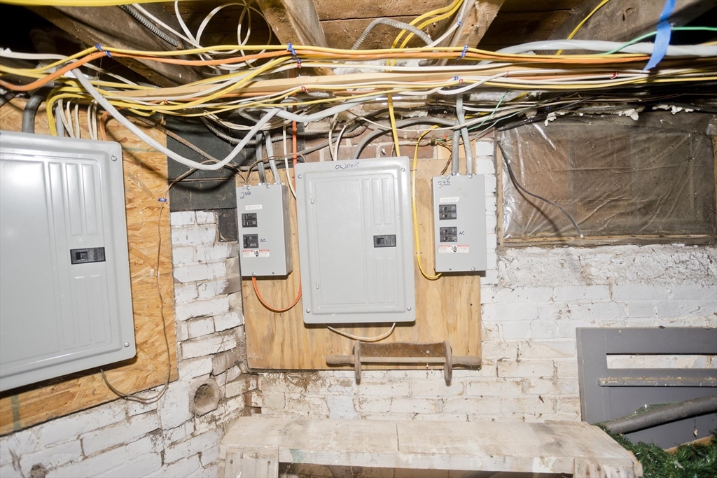 202 Oakland Street Springfield, MA 01108 - Photo 37 of 39 a view of a patio with a table and chairs