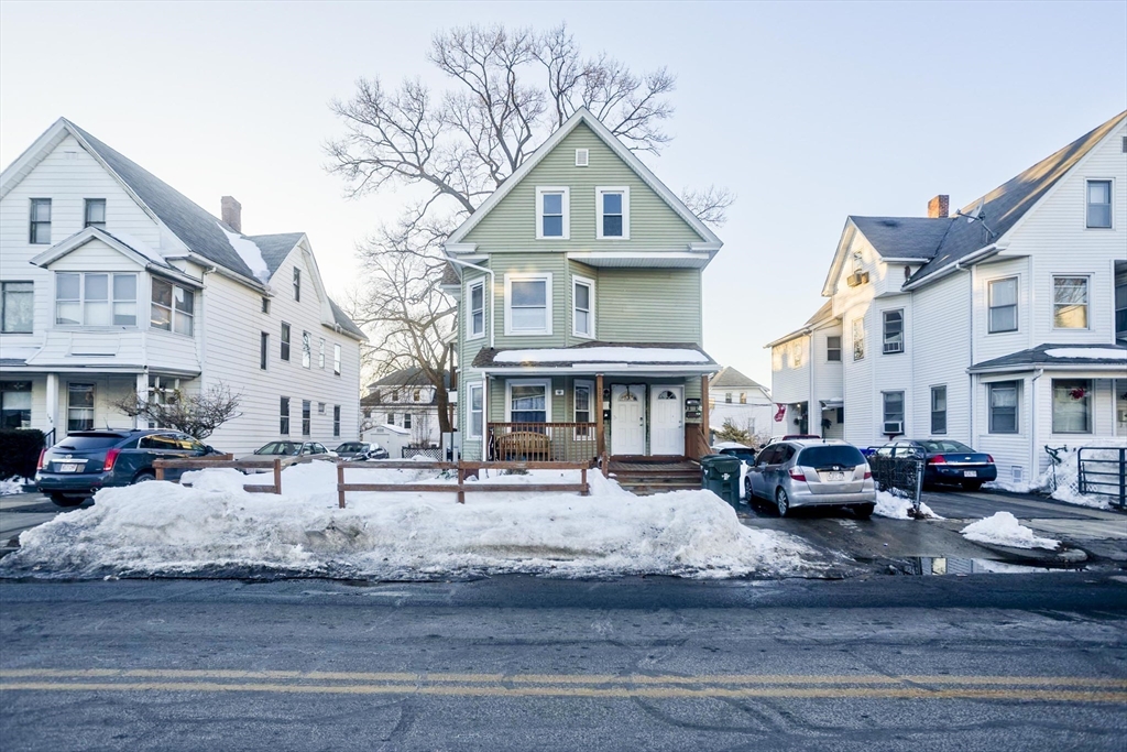 202 Oakland Street Springfield, MA 01108 - Photo 38 of 39 a front view of a building with lots of cars parked