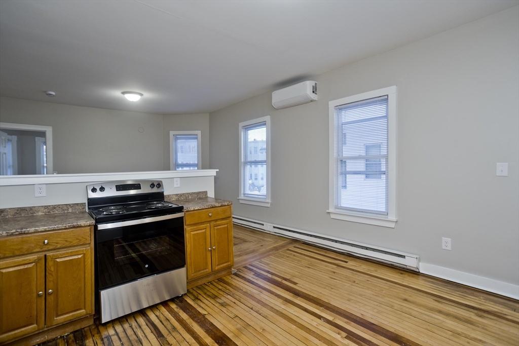 202 Oakland Street Springfield, MA 01108 - Photo 7 of 39 a kitchen with a stove oven and sink