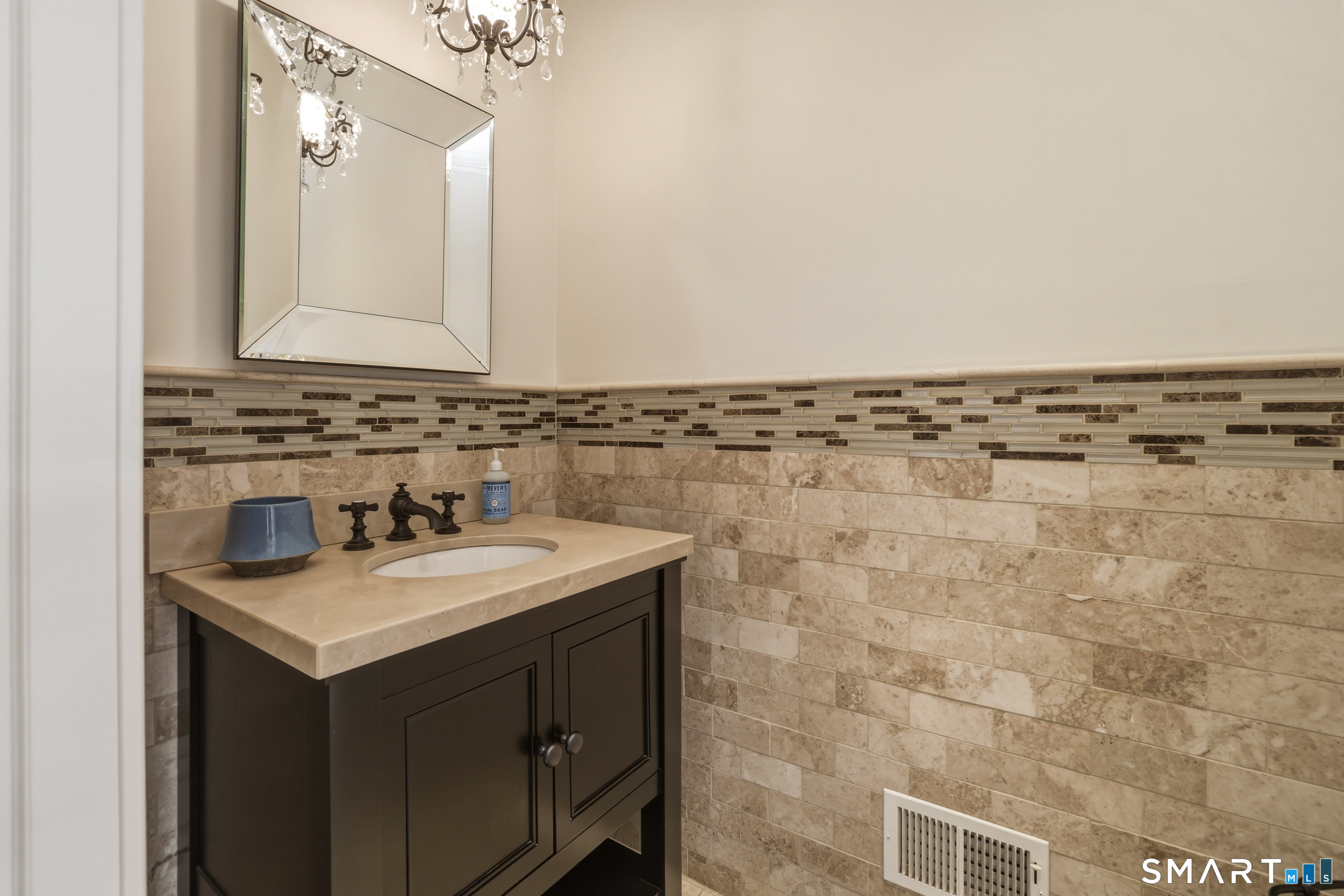 7 Timber Lane Guilford, CT 06437 - Photo 12 of 40 a bathroom with a sink vanity and a mirror